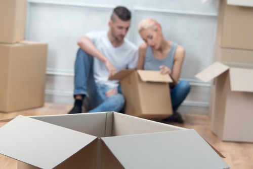 Furniture being carried carefully through a Stockwell residential property