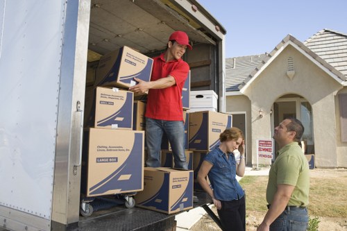 Moving preparation checklist and packed boxes for a Stockwell removal service