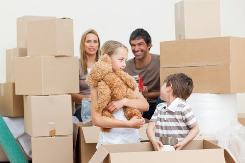 Packed moving boxes and furniture prepared for house removals in Stockwell